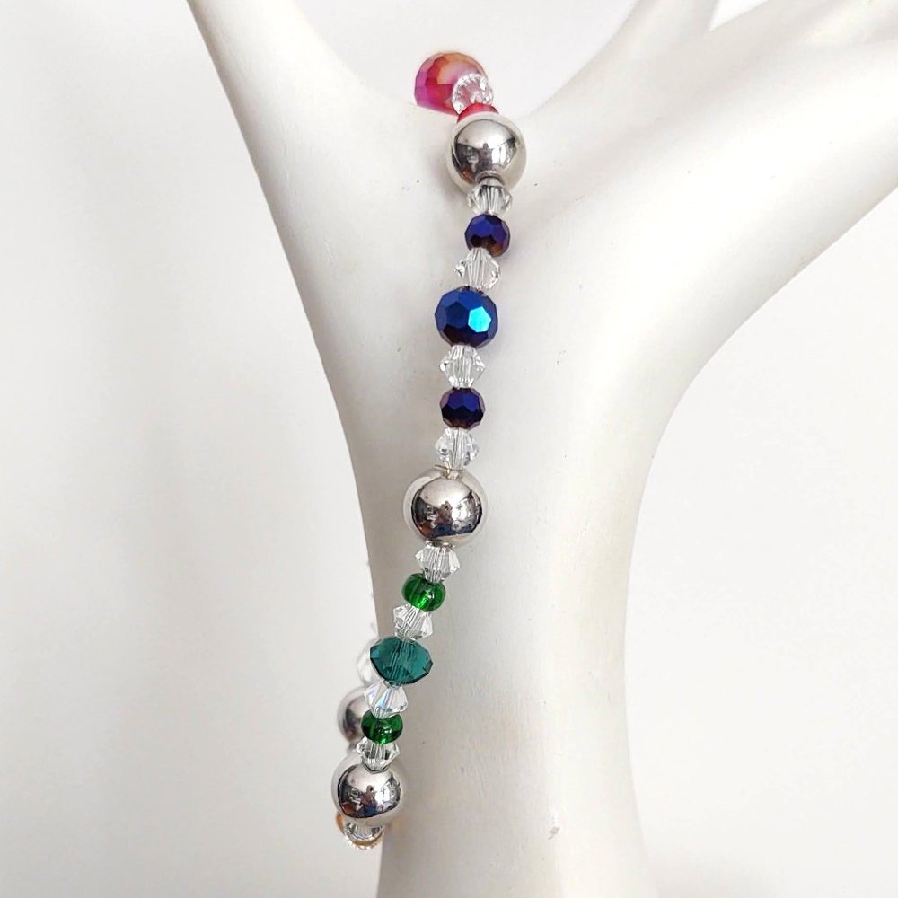 Red, blue, green, clear and honey crystal bracelet with silver accents